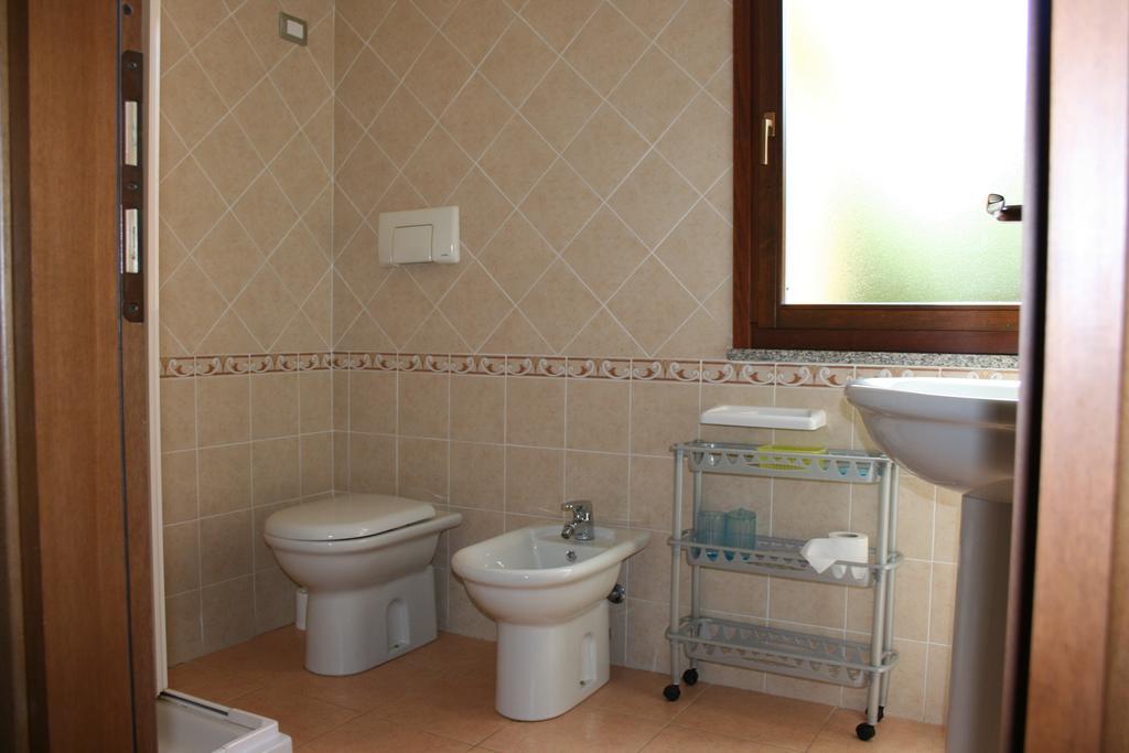 Casa Vacanze Stella Marina Monte Nai Værelse billede